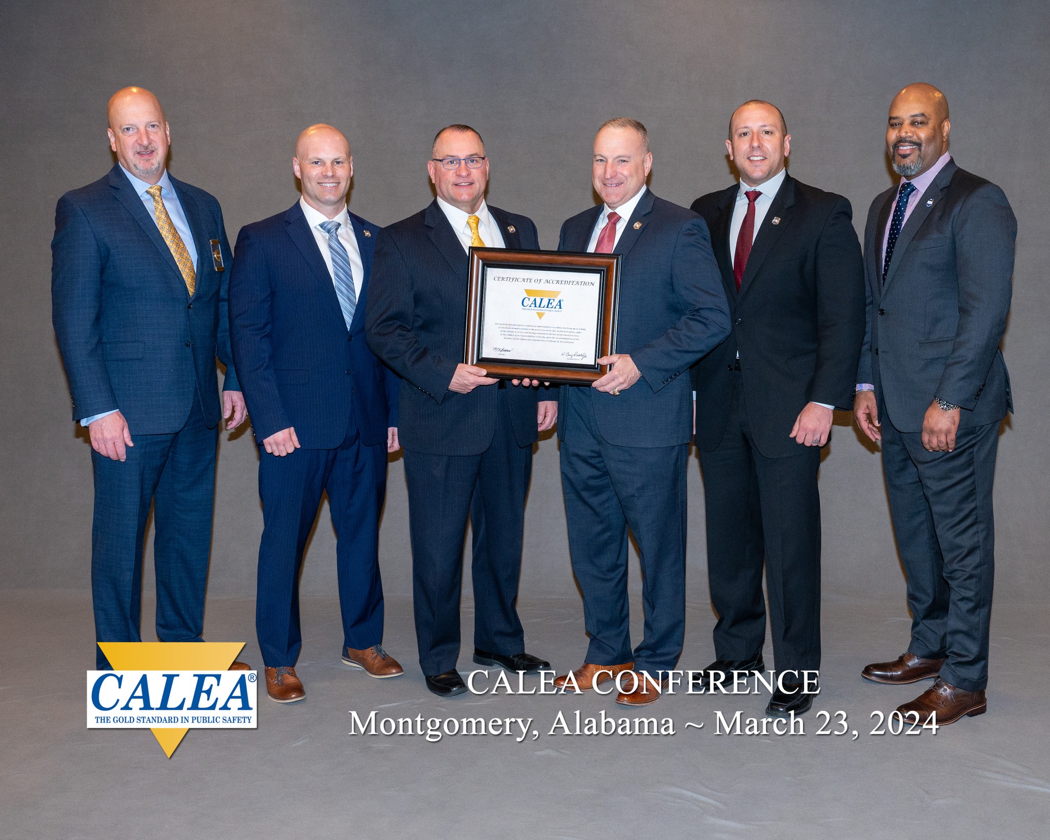 L-R: CALEA Executive Director W. Craig Hartley, Jr., Lieut. Dave Miner, Dep. Chief Paul Gately, Chief L. J. Fusaro, Officer Chris Banks and Commission Chairman Marlon Lynch